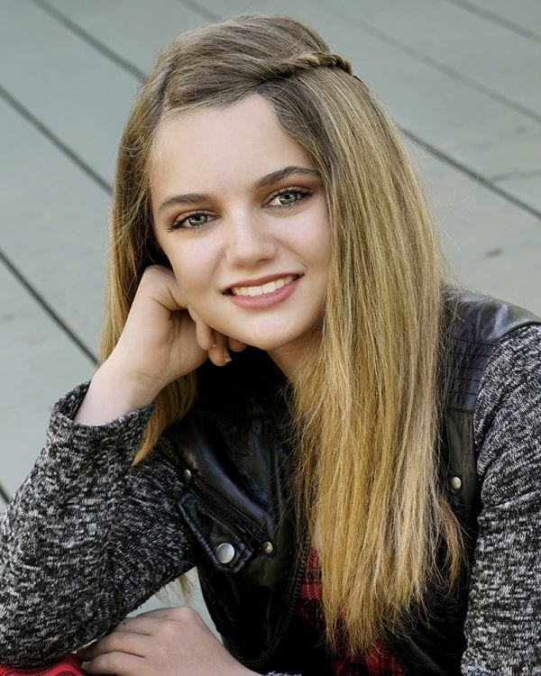 Portrait of a teen girl in warm clothes
