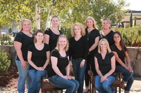 Family portrait all wearing black with only women