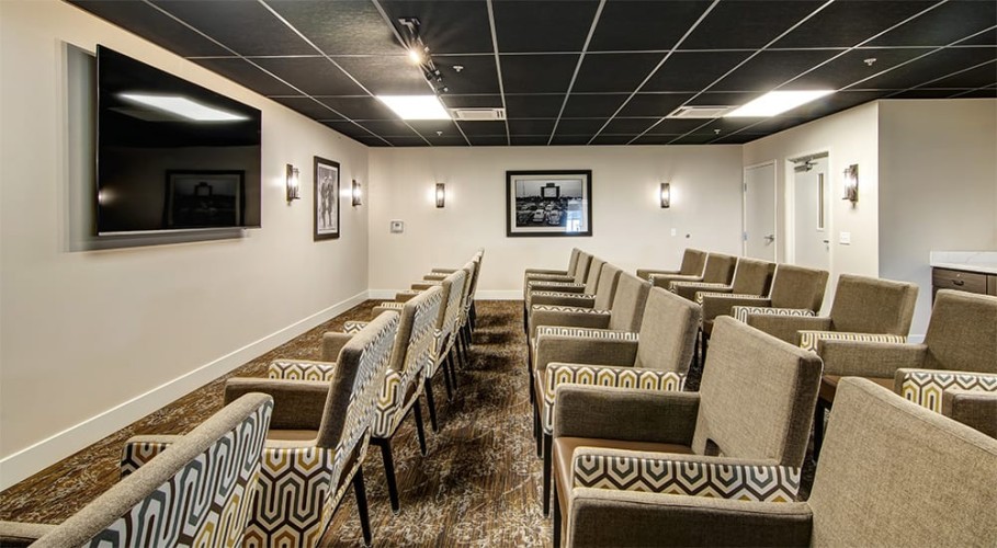 Movie theater room with cushy stylish seating