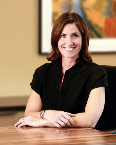 Portrait of a business woman in an office wearing black