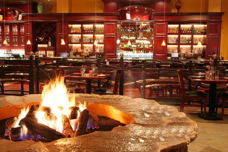 Bentley's Lounge Bar Interior view from near fire pit towards full bar